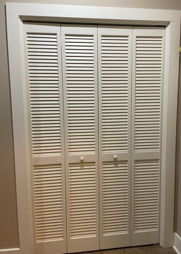 Shelter hidden by closet doors inside of home