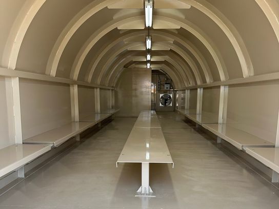 Interior of a Safe-T-Shelter Mobile Platform Based Shelter with bench seating